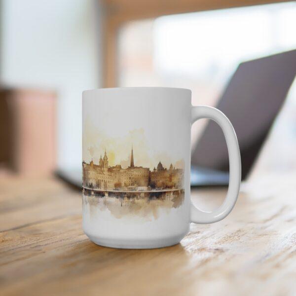 Bedruckte Kaffeetasse mit Aquarell Skyline von Dresden als ideales Geschenk