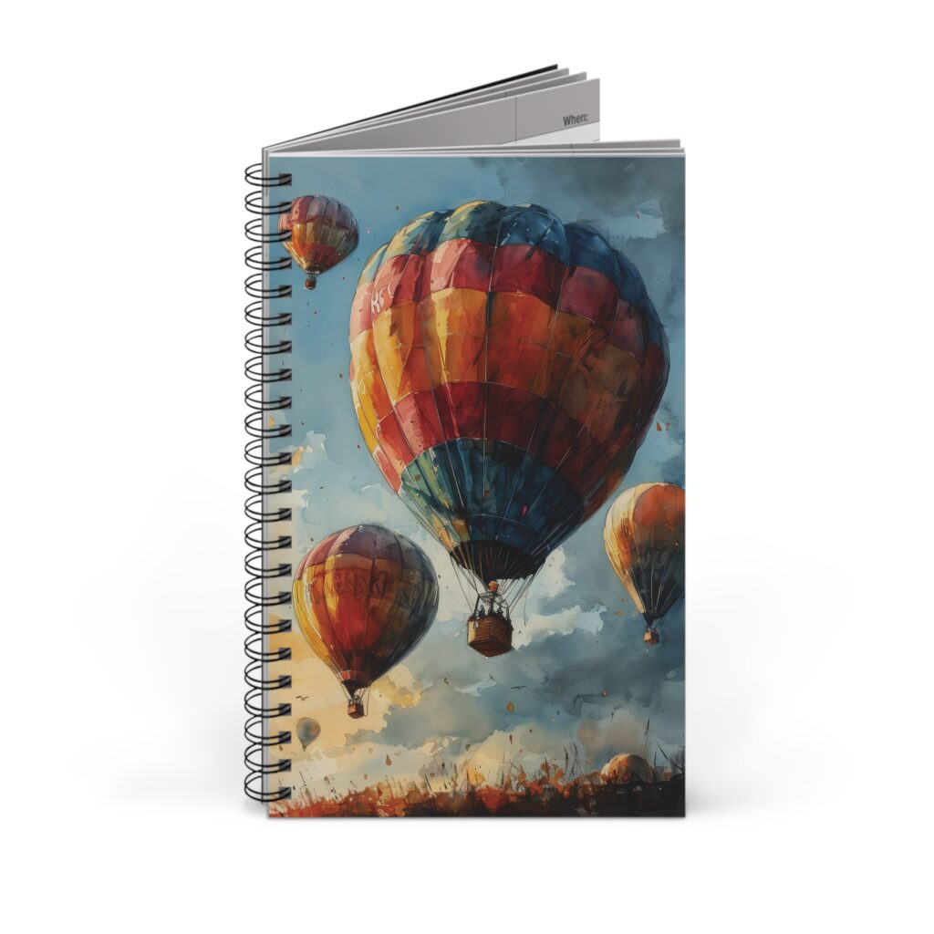Notizbuch mit bunten Hei&szlig;luftballons auf dem Cover, ideal f&uuml;r kreative Notizen und Skizzen, inspiriert von Luftfahrt und Abenteuer.